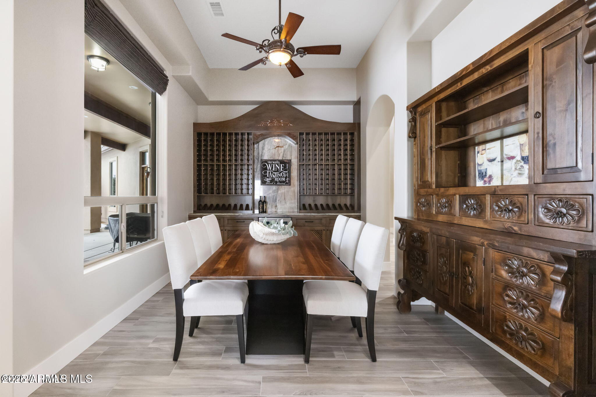 4140 Chuckwalla Road Prescott, AZ 86305 - Photo 11 of 77 a view of a a dining room with furniture window and wooden floor