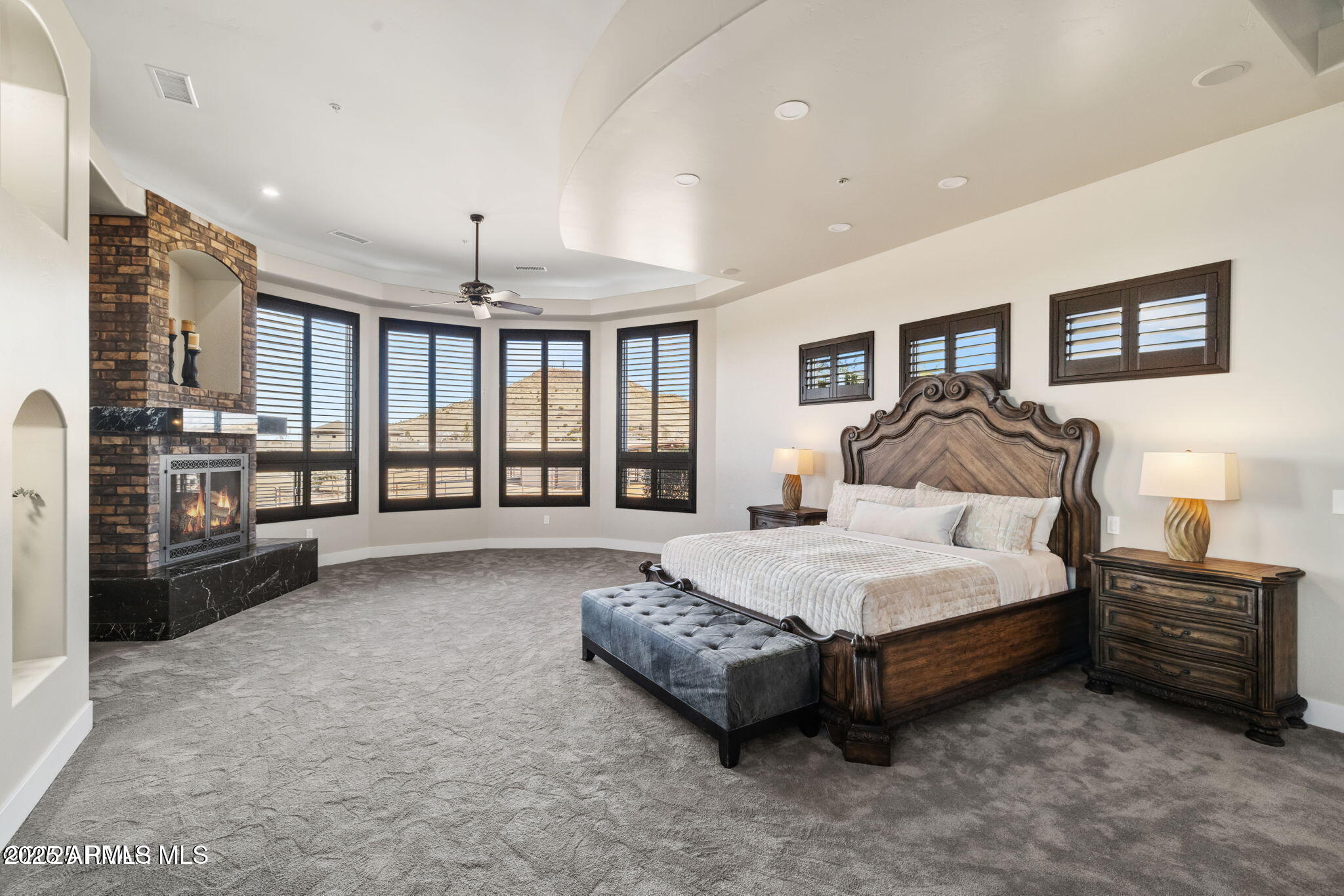 4140 Chuckwalla Road Prescott, AZ 86305 - Photo 27 of 77 a spacious bedroom with a bed and a large window