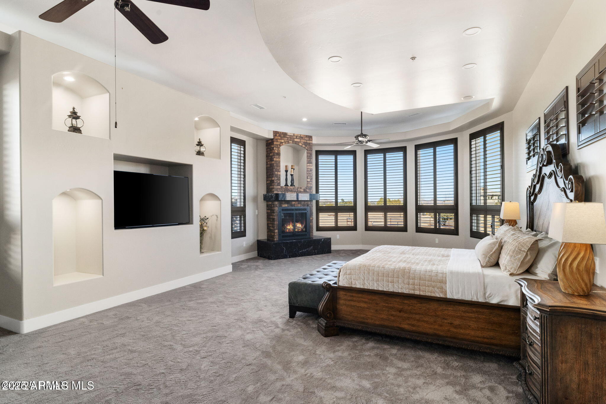 4140 Chuckwalla Road Prescott, AZ 86305 - Photo 28 of 77 a spacious bedroom with a bed and a television