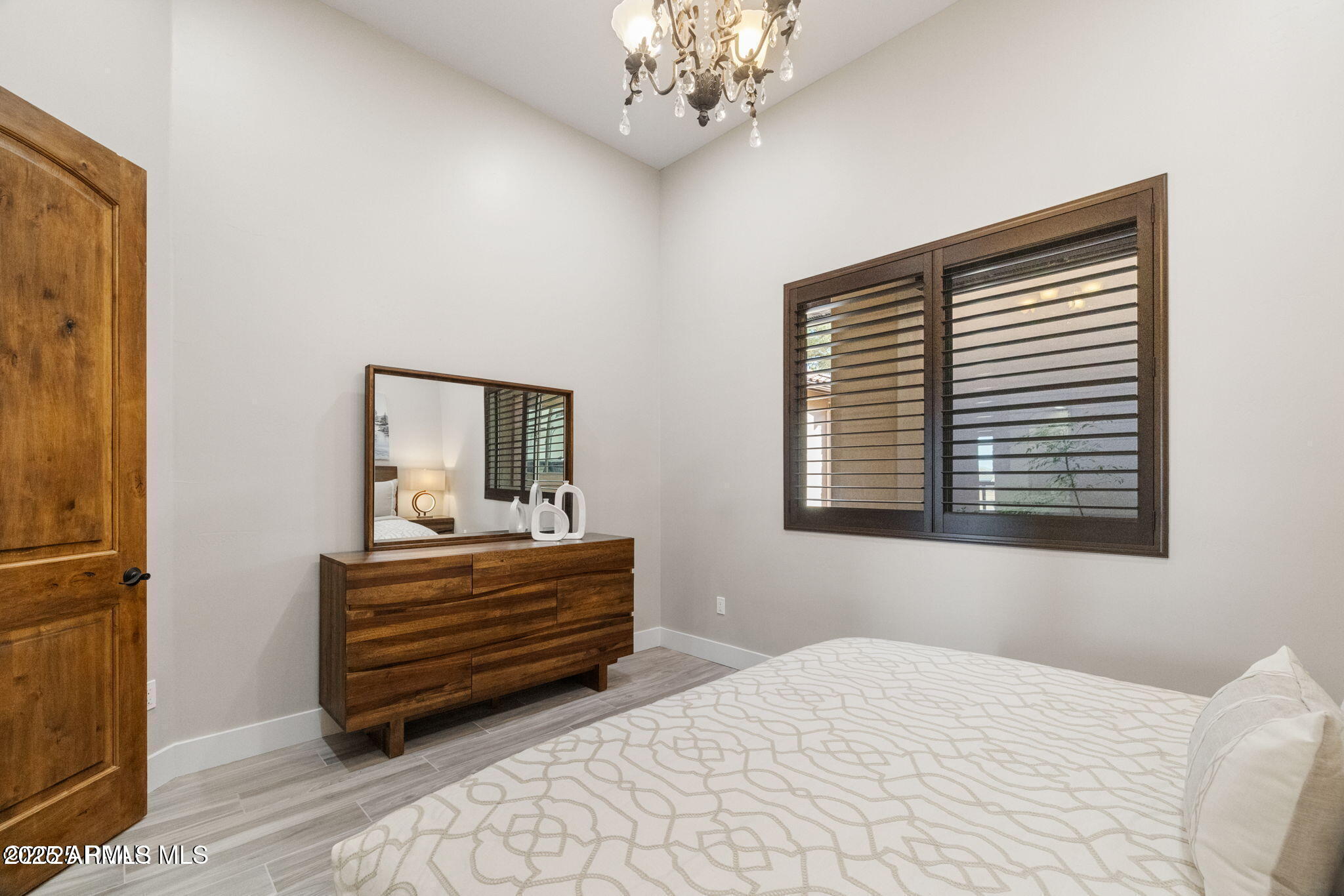 4140 Chuckwalla Road Prescott, AZ 86305 - Photo 37 of 77 a bedroom with a bed and a window