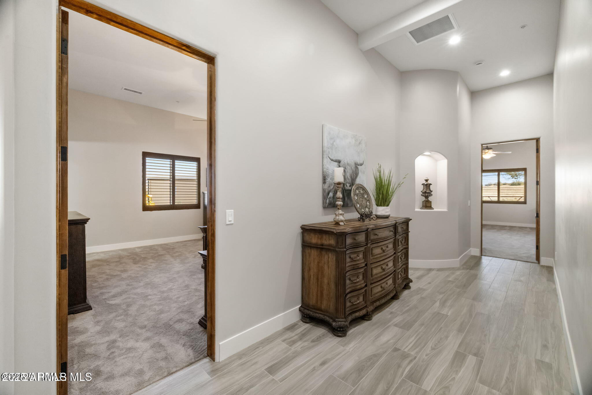 4140 Chuckwalla Road Prescott, AZ 86305 - Photo 40 of 77 a view of a hallway with wooden floor windows and a kitchen