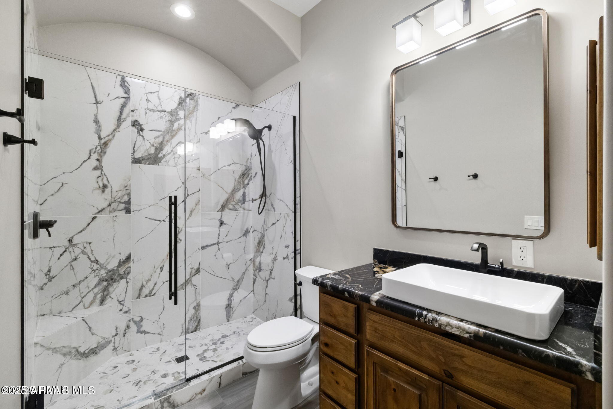 4140 Chuckwalla Road Prescott, AZ 86305 - Photo 43 of 77 a bathroom with a granite countertop sink toilet and shower