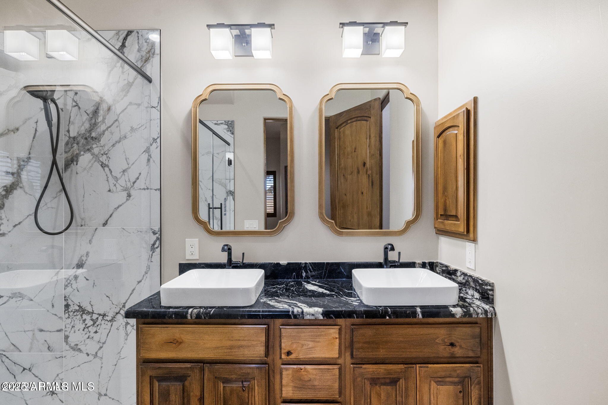 4140 Chuckwalla Road Prescott, AZ 86305 - Photo 49 of 77 a bathroom with double vanity sinks and a granite