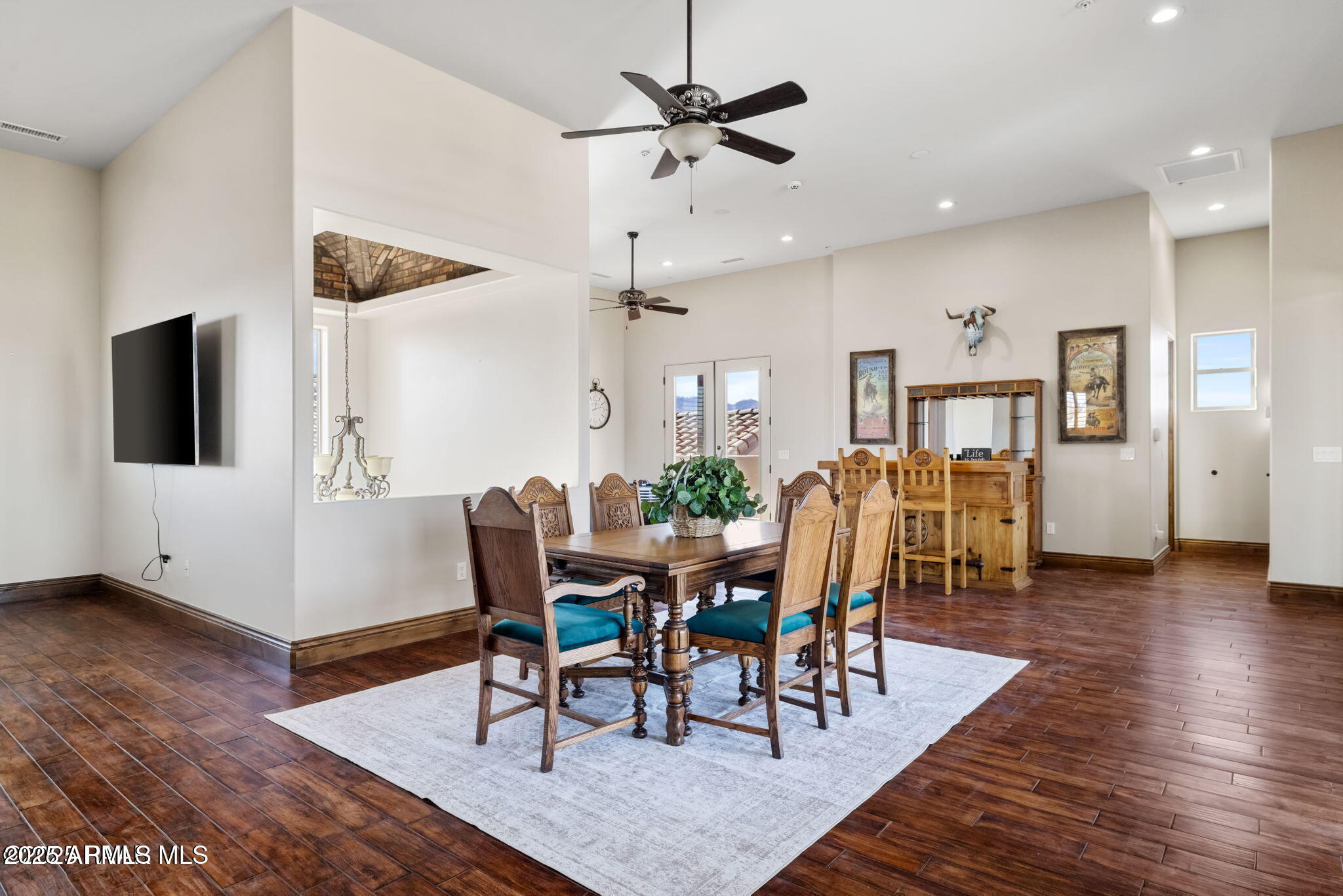 4140 Chuckwalla Road Prescott, AZ 86305 - Photo 53 of 77 a view of a dining room with furniture and wooden floor