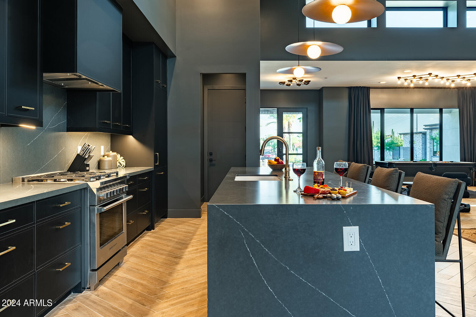 13696 North 88th Place Scottsdale, AZ 85260 - Photo 20 of 60 a view of a kitchen with stainless steel appliances granite countertop a living room