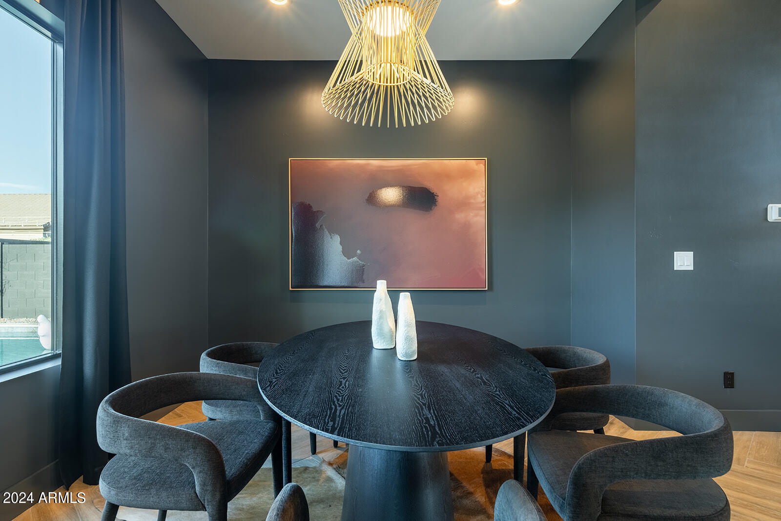 13696 North 88th Place Scottsdale, AZ 85260 - Photo 21 of 60 a lamp sitting on a table and chair in a room