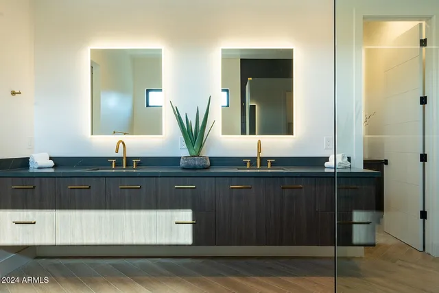 a bedroom with a bed and a couch