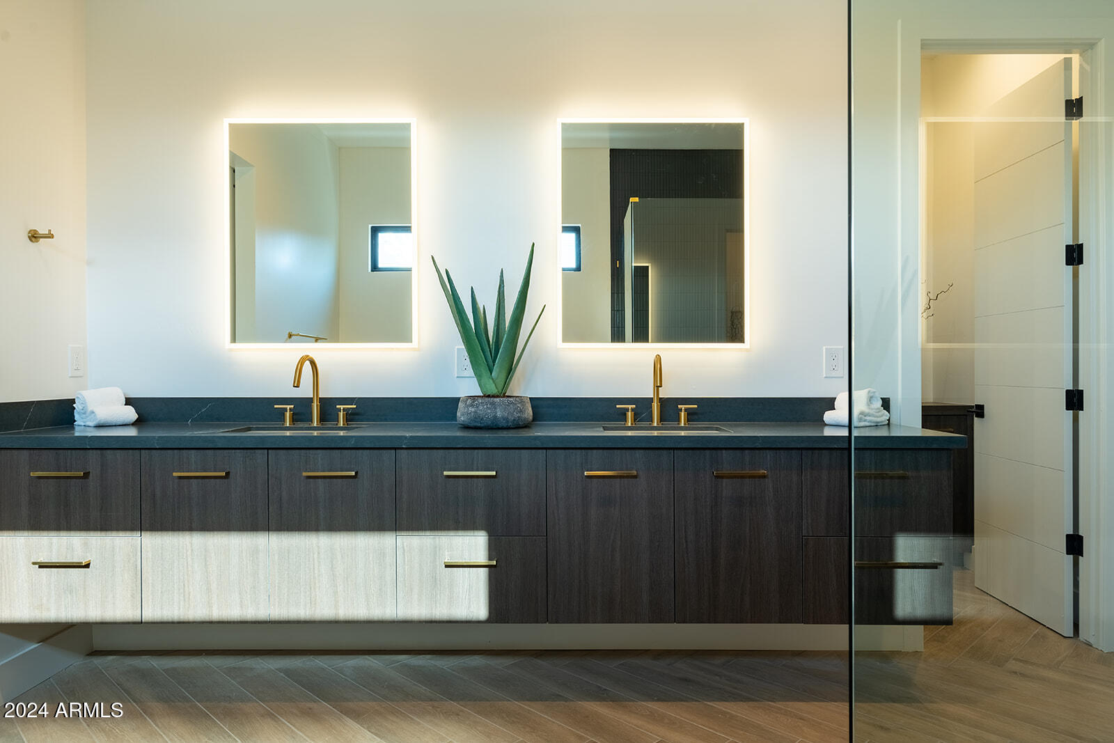13696 North 88th Place Scottsdale, AZ 85260 - Photo 29 of 60 a bathroom with a sink and a mirror