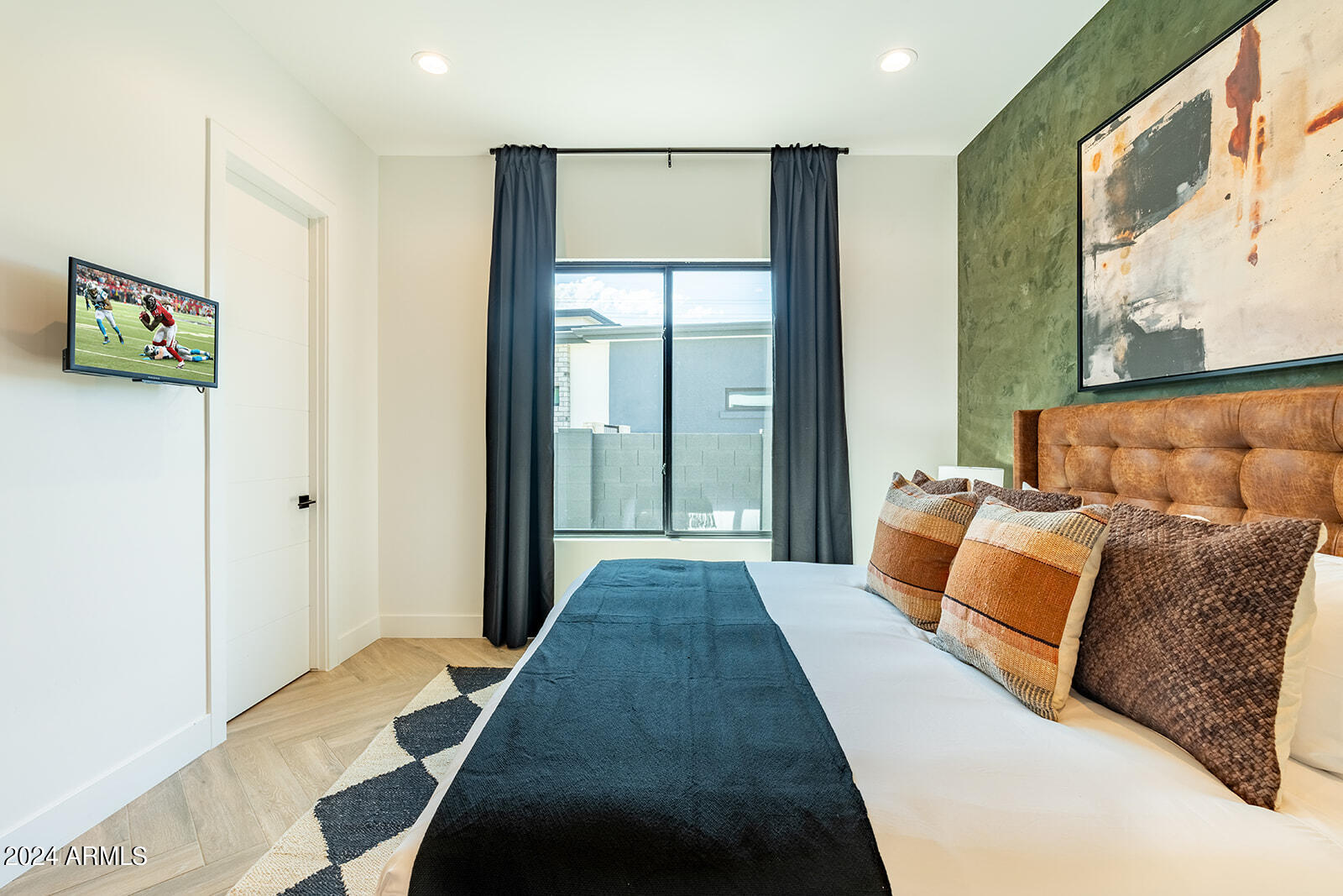 13696 North 88th Place Scottsdale, AZ 85260 - Photo 31 of 60 a bedroom with a bed and window