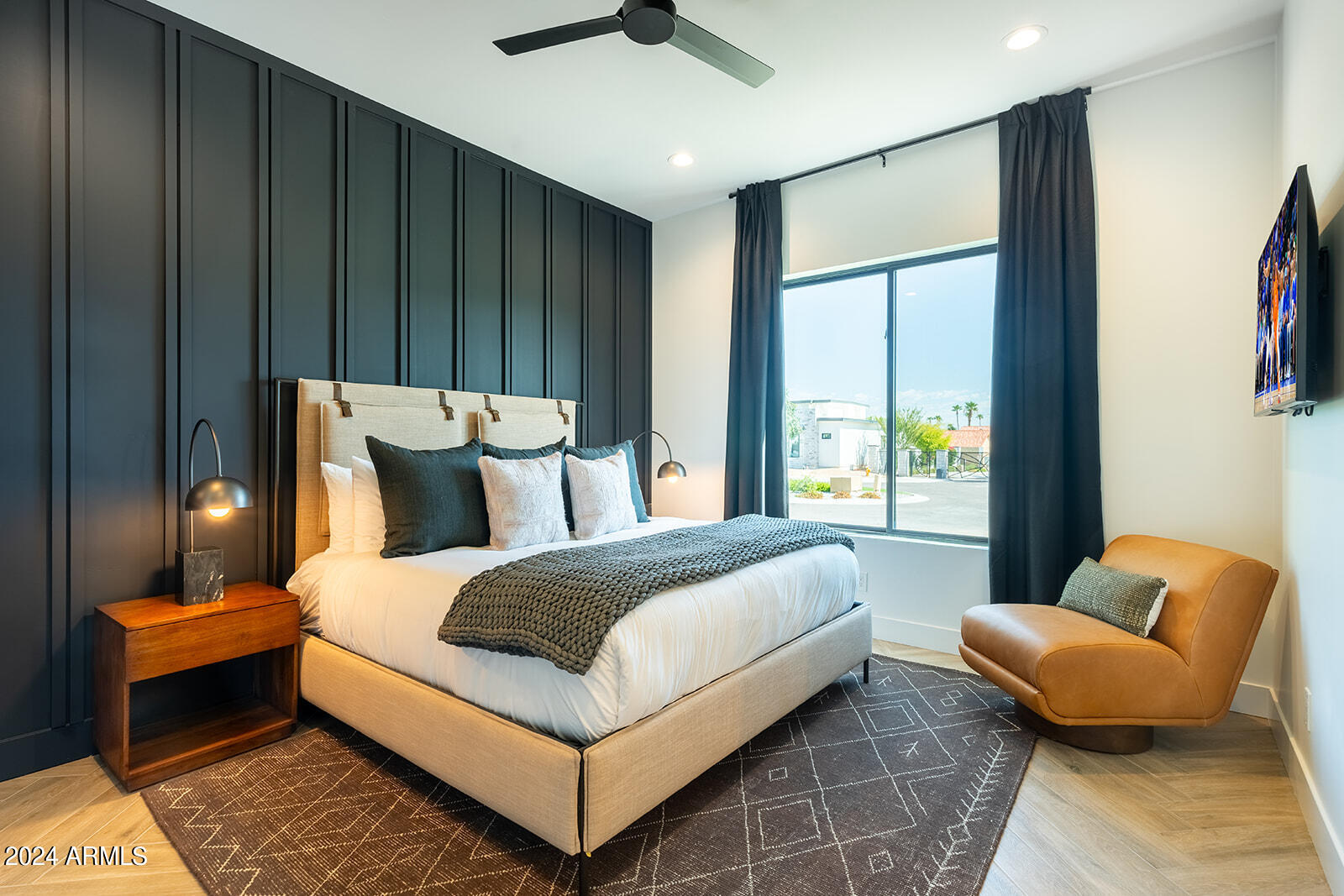 13696 North 88th Place Scottsdale, AZ 85260 - Photo 38 of 60 a bedroom with bed and a couch