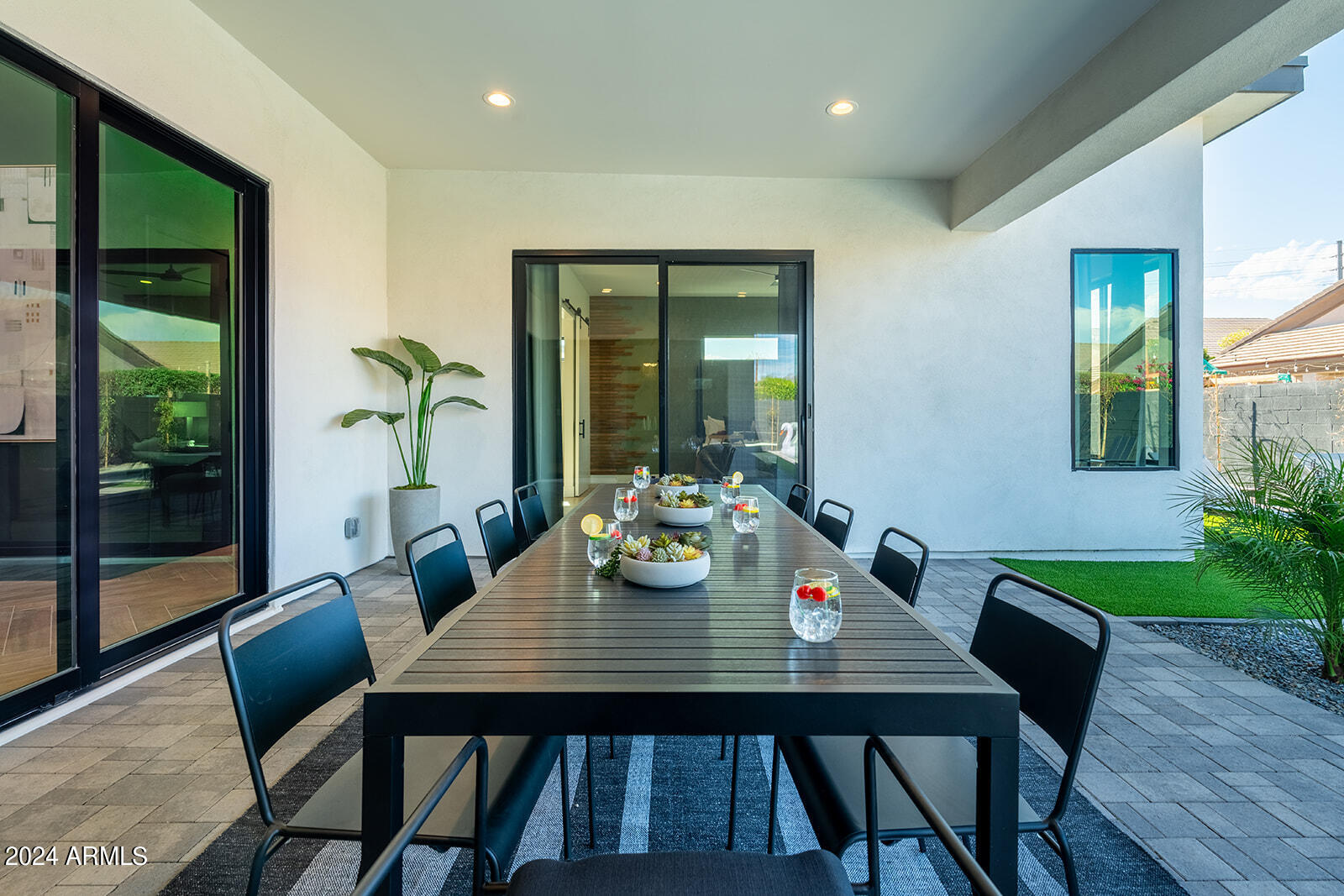 13696 North 88th Place Scottsdale, AZ 85260 - Photo 44 of 60 a view of a dining room with furniture window and wooden floor