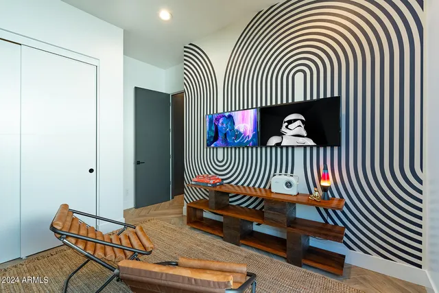 a view of swimming pool with outdoor seating