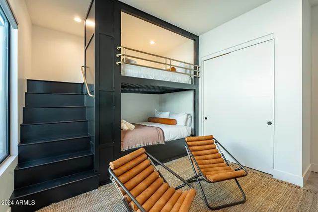 a view of a lobby with chair and dining table