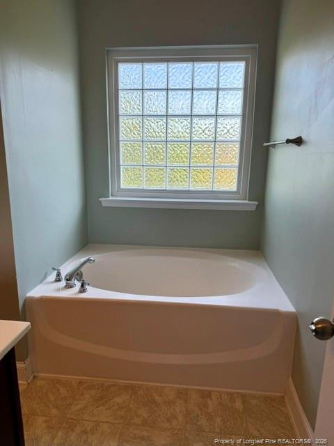 1284 L L Cooper Road Cameron, NC 28326 - Photo 9 of 24 a bathroom with a bathtub