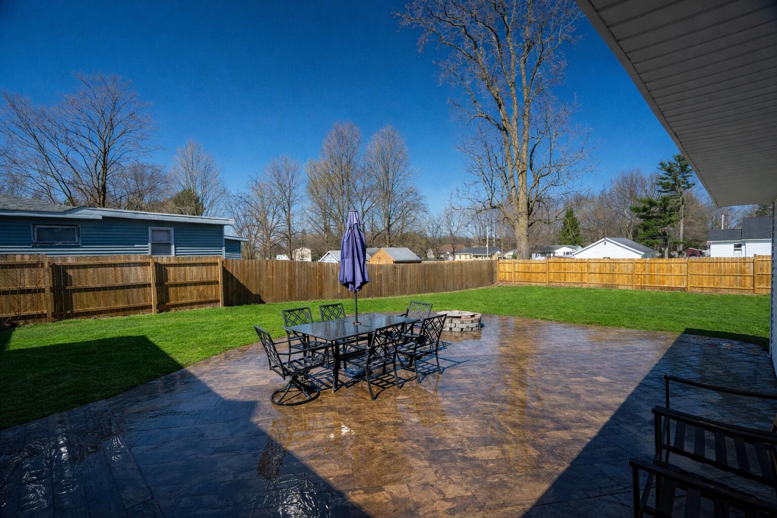 24340 Front Street Mattawan, MI 49071 - Photo 26 of 32 Sunny backyard with outdoor dining set