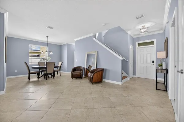 a kitchen with stainless steel appliances kitchen island granite countertop a sink and cabinets