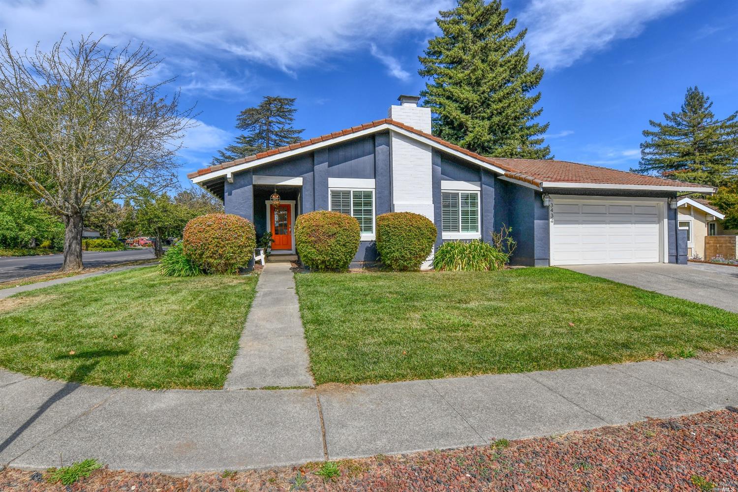 a front view of house with yard