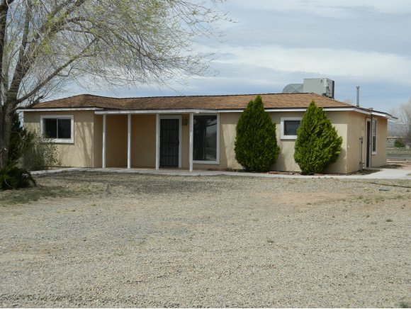 1550 Ranch House Road Paulden, AZ 86334 - Photo 1 of 24 front view of a house with a garden