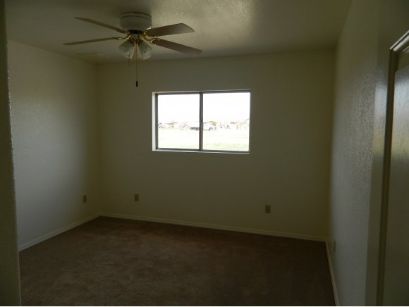 1550 Ranch House Road Paulden, AZ 86334 - Photo 13 of 24 an empty room with a window