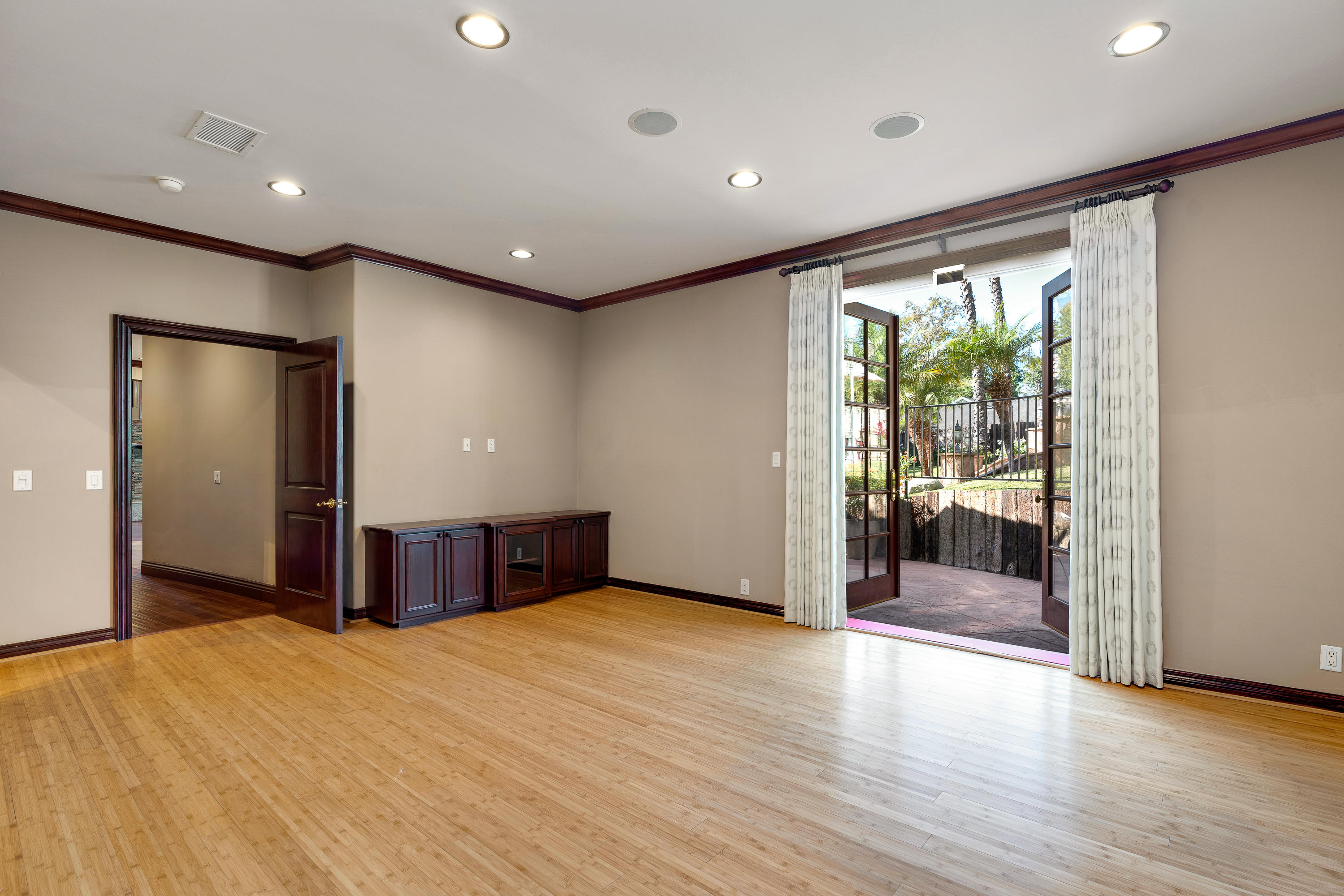 825 Chehalem Road La Canada Flintridge, CA 91011 - Photo 13 of 24 a view of an empty room with wooden floor