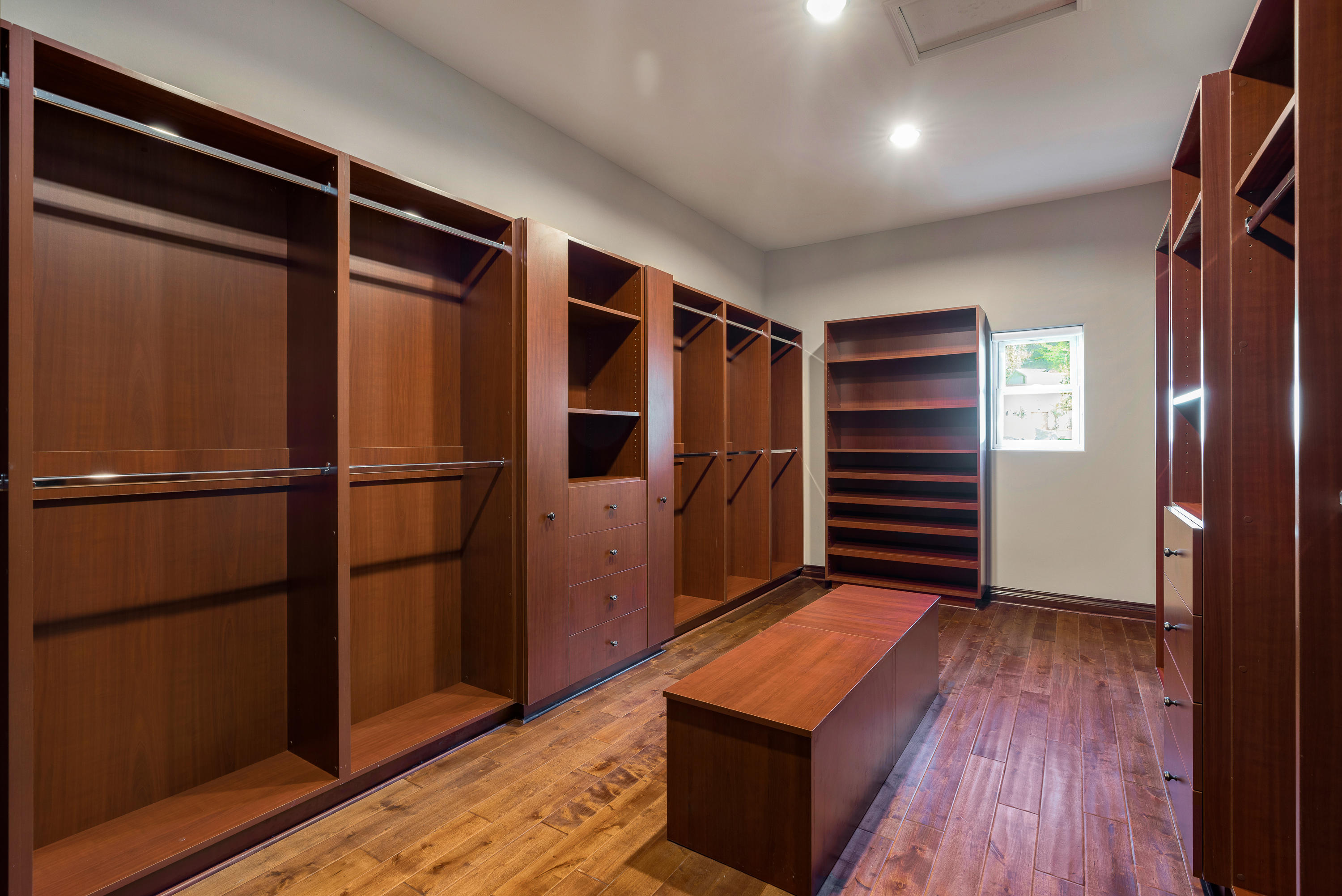 825 Chehalem Road La Canada Flintridge, CA 91011 - Photo 17 of 24 a view of walk in closet with wooden floor and windows