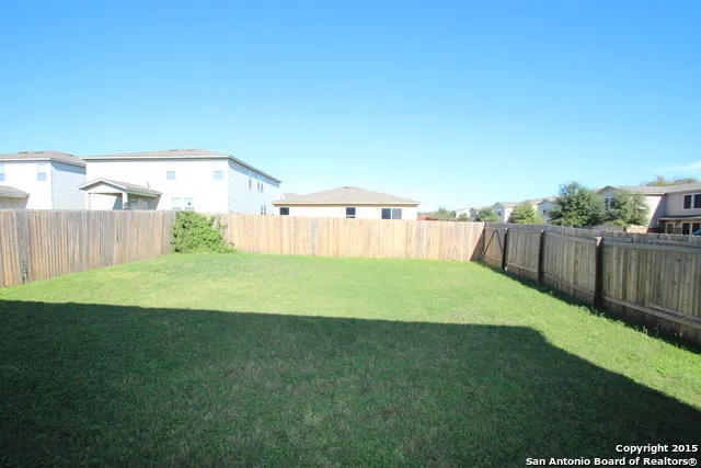 a view of a backyard with a garden