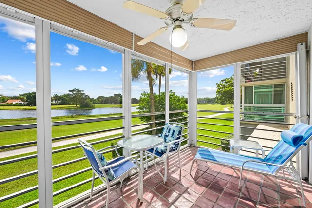a view of a chairs and table in a patio