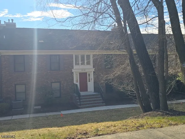 a front view of a house with a garage