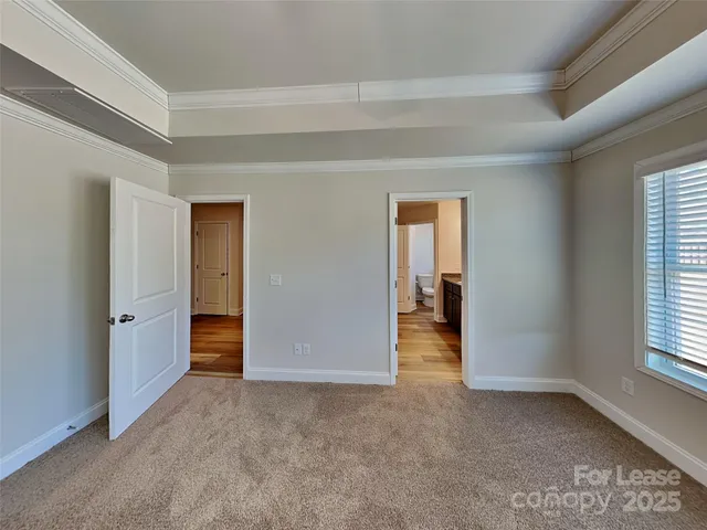 a view of an empty room and window