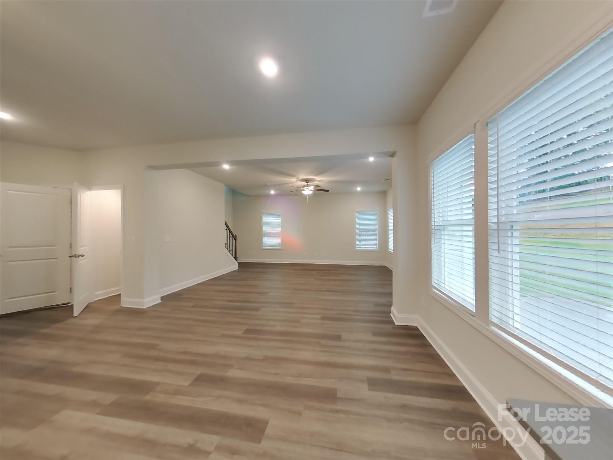 139 Queenshall Road Mooresville, NC 28117 - Photo 6 of 24 a view of an empty room and window
