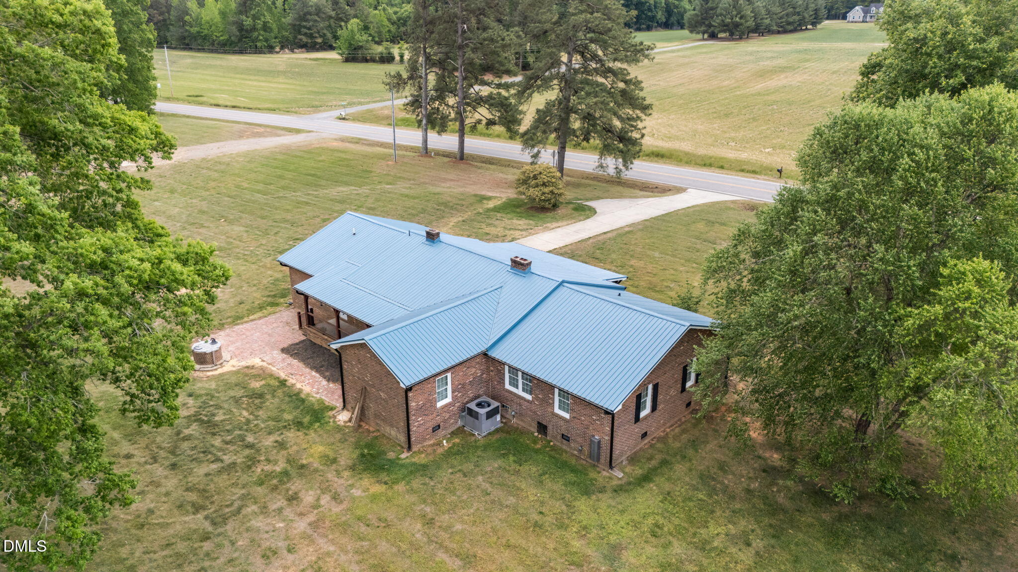 3611 Chewning Road Oxford, NC 27565 - Photo 27 of 45 an aerial view of a house with outdoor space and lake view in back