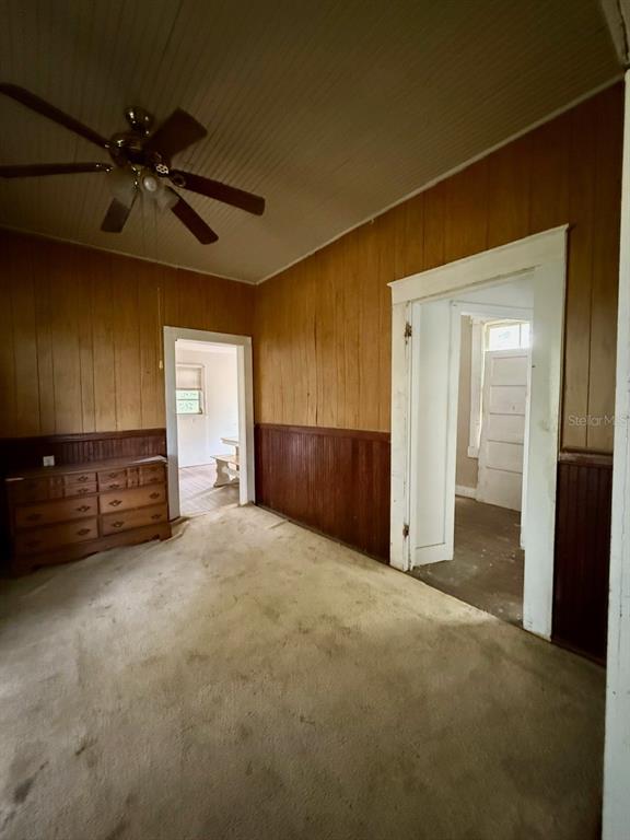 10010 Fort King Road Dade City, FL 33525 - Photo 12 of 36 a view of an empty room with a cabinet