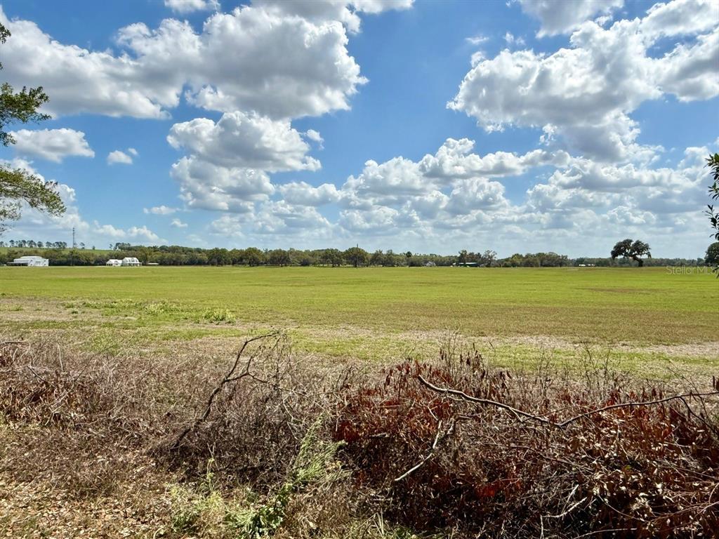 10010 Fort King Road Dade City, FL 33525 - Photo 22 of 36 a city view with ocean