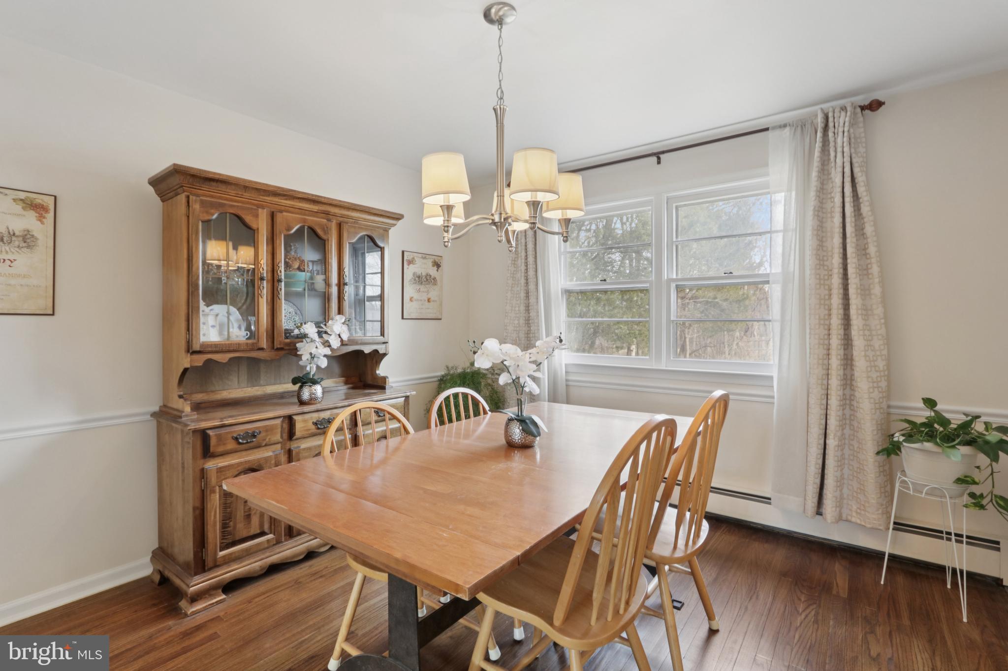 980 Bear Tavern Road Titusville, NJ 08560 - Photo 15 of 66 a view of a dining room with furniture window and wooden floor