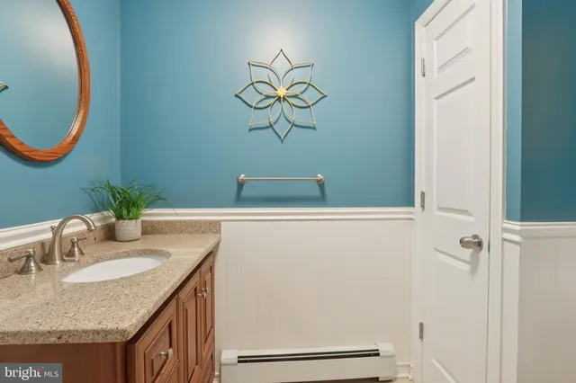 a bedroom with a bed and dresser