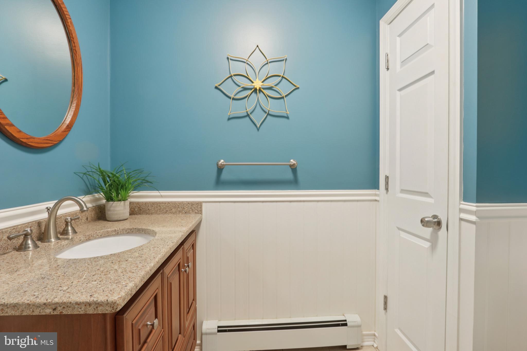 980 Bear Tavern Road Titusville, NJ 08560 - Photo 38 of 66 a bathroom with a granite countertop sink a vanity and a mirror