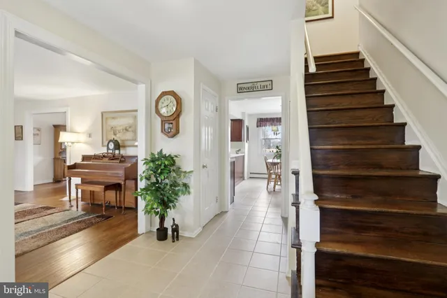 a bedroom with a bed and a lamp