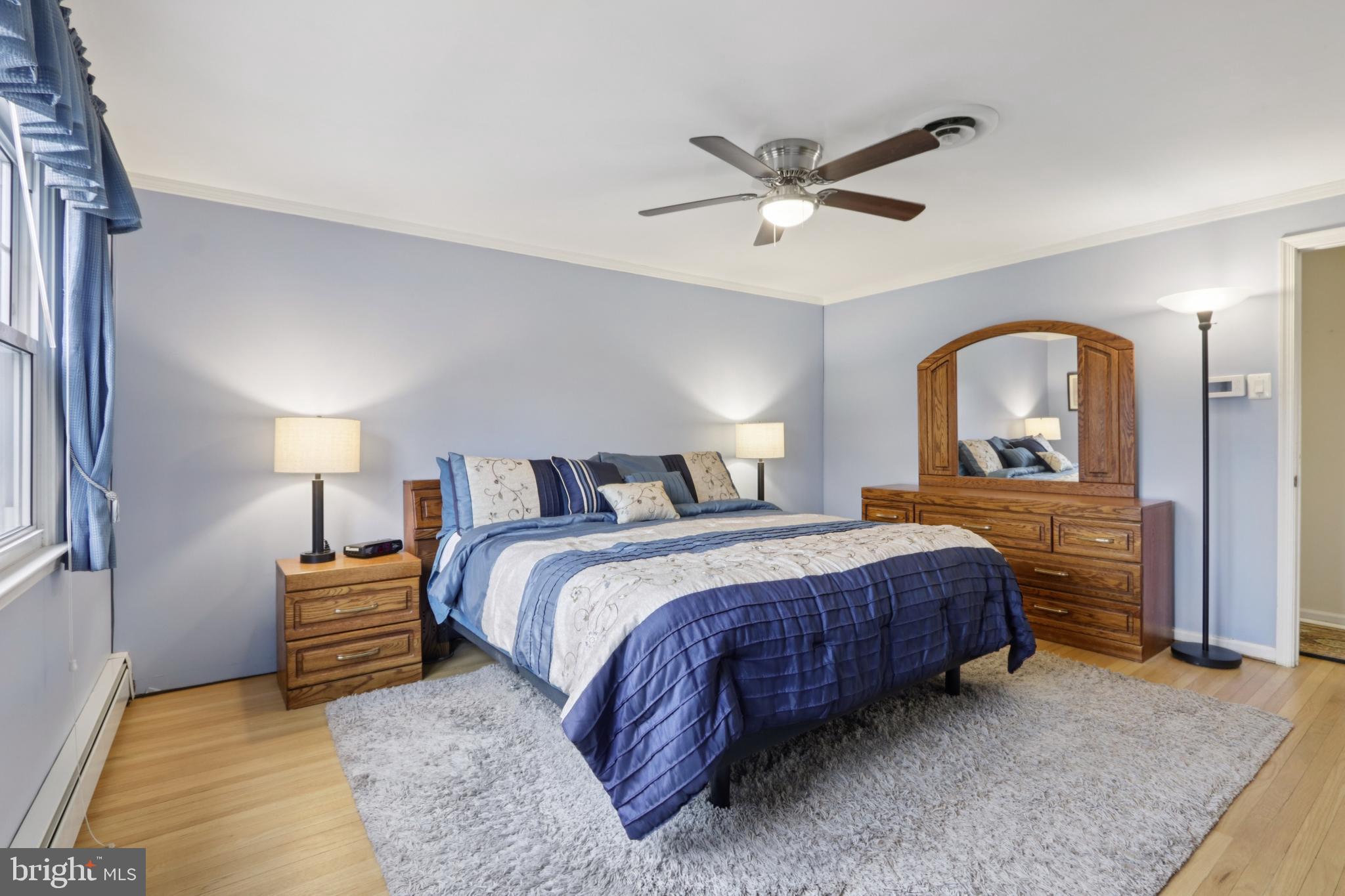 980 Bear Tavern Road Titusville, NJ 08560 - Photo 45 of 66 a bedroom with a bed and a mirror