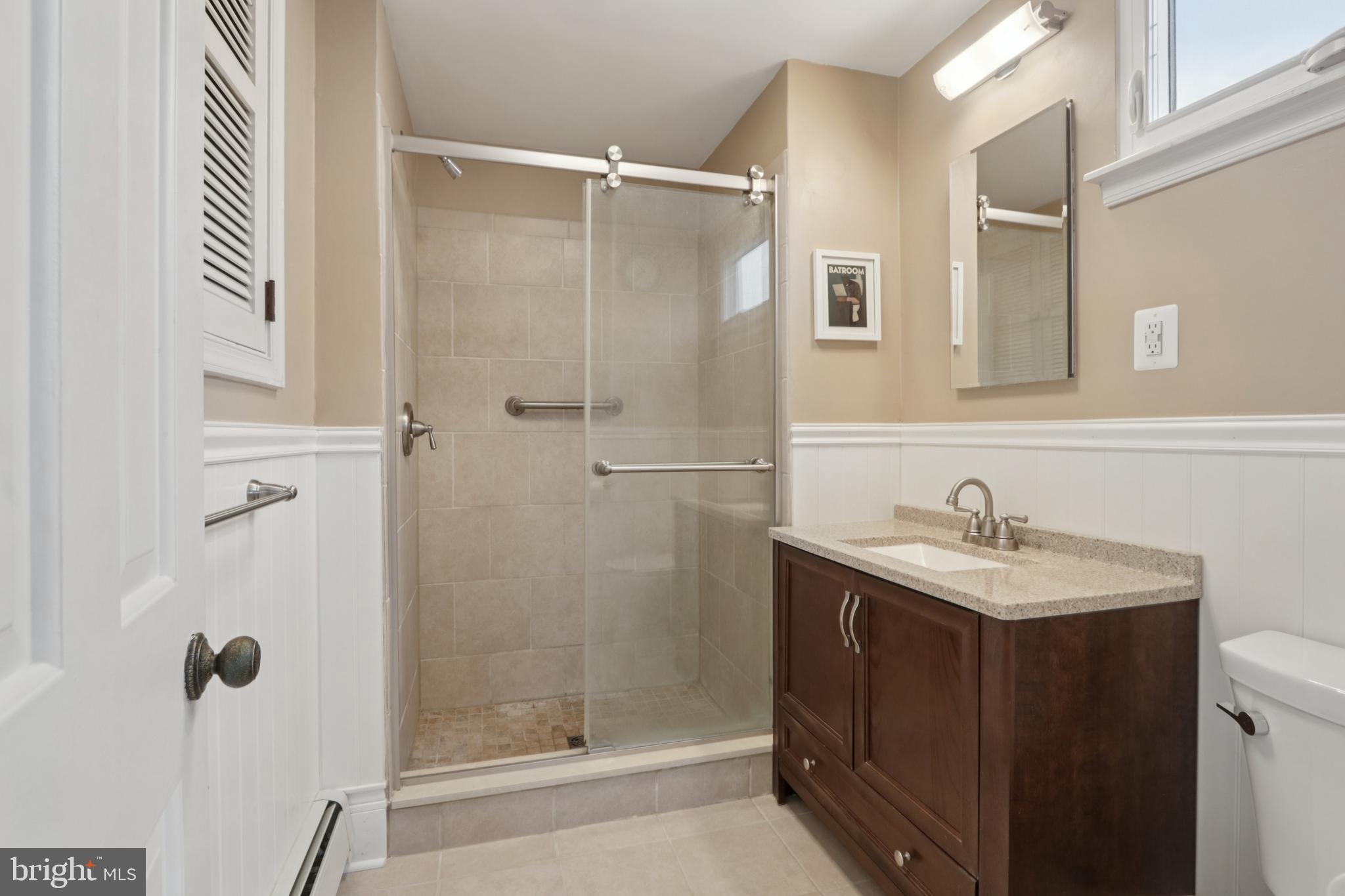 980 Bear Tavern Road Titusville, NJ 08560 - Photo 48 of 66 a bathroom with a granite countertop sink a mirror and shower