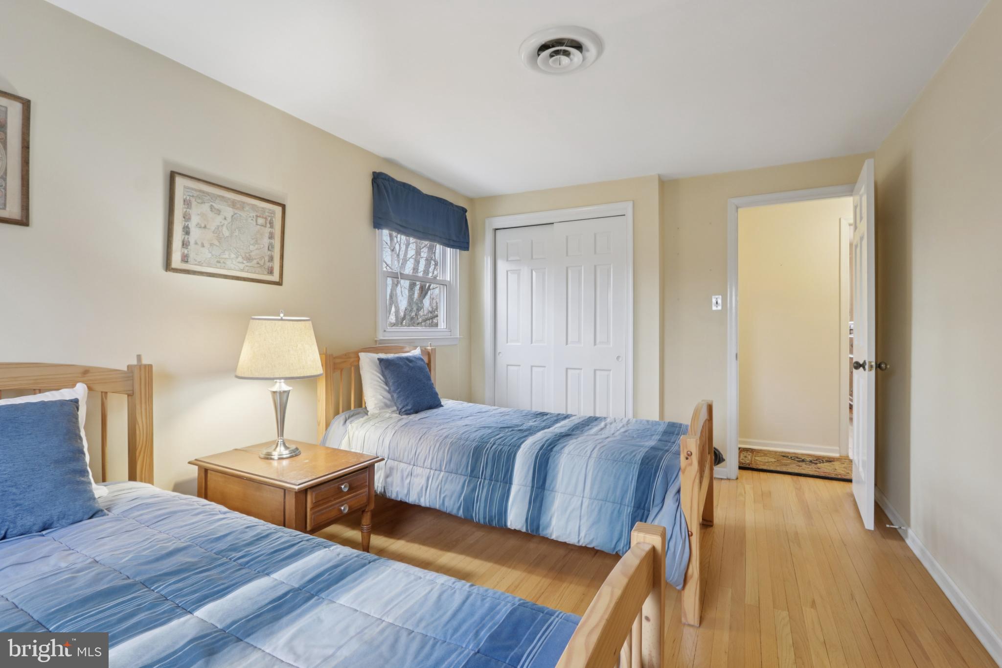 980 Bear Tavern Road Titusville, NJ 08560 - Photo 54 of 66 a bedroom with a bed and a lamp