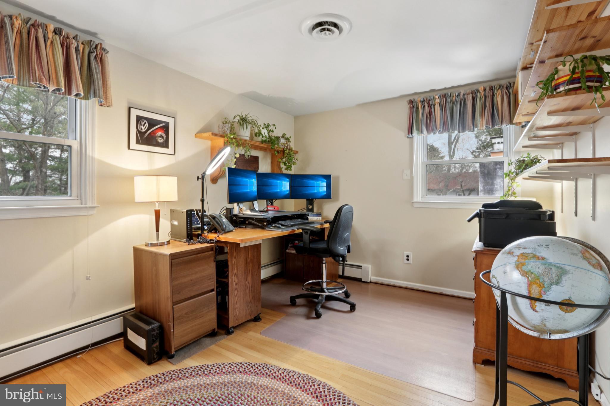 980 Bear Tavern Road Titusville, NJ 08560 - Photo 55 of 66 a view of a workspace with furniture and a window