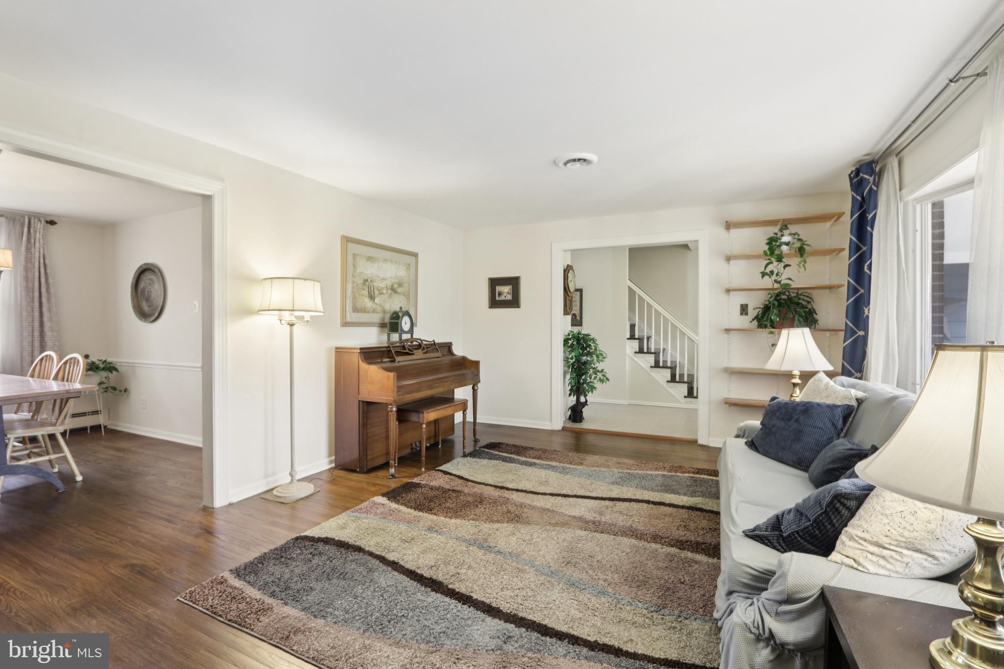980 Bear Tavern Road Titusville, NJ 08560 - Photo 7 of 66 a living room with furniture and a fireplace