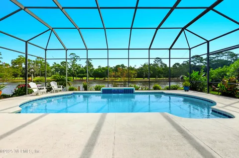 a view of a swimming pool and a porch