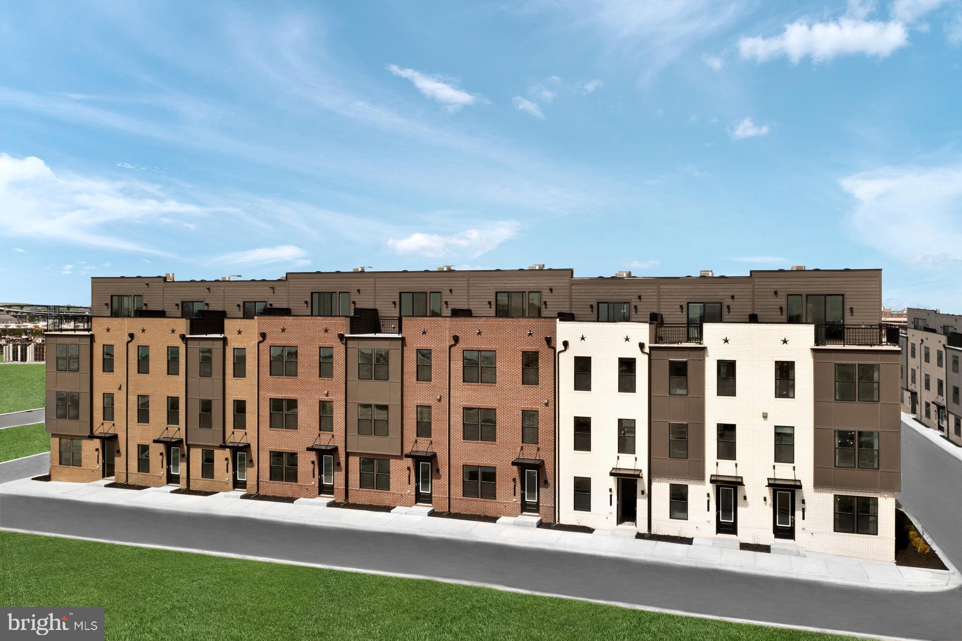 279 Light Street Baltimore, MD 21230 - Photo 2 of 29 a view of building with a yard