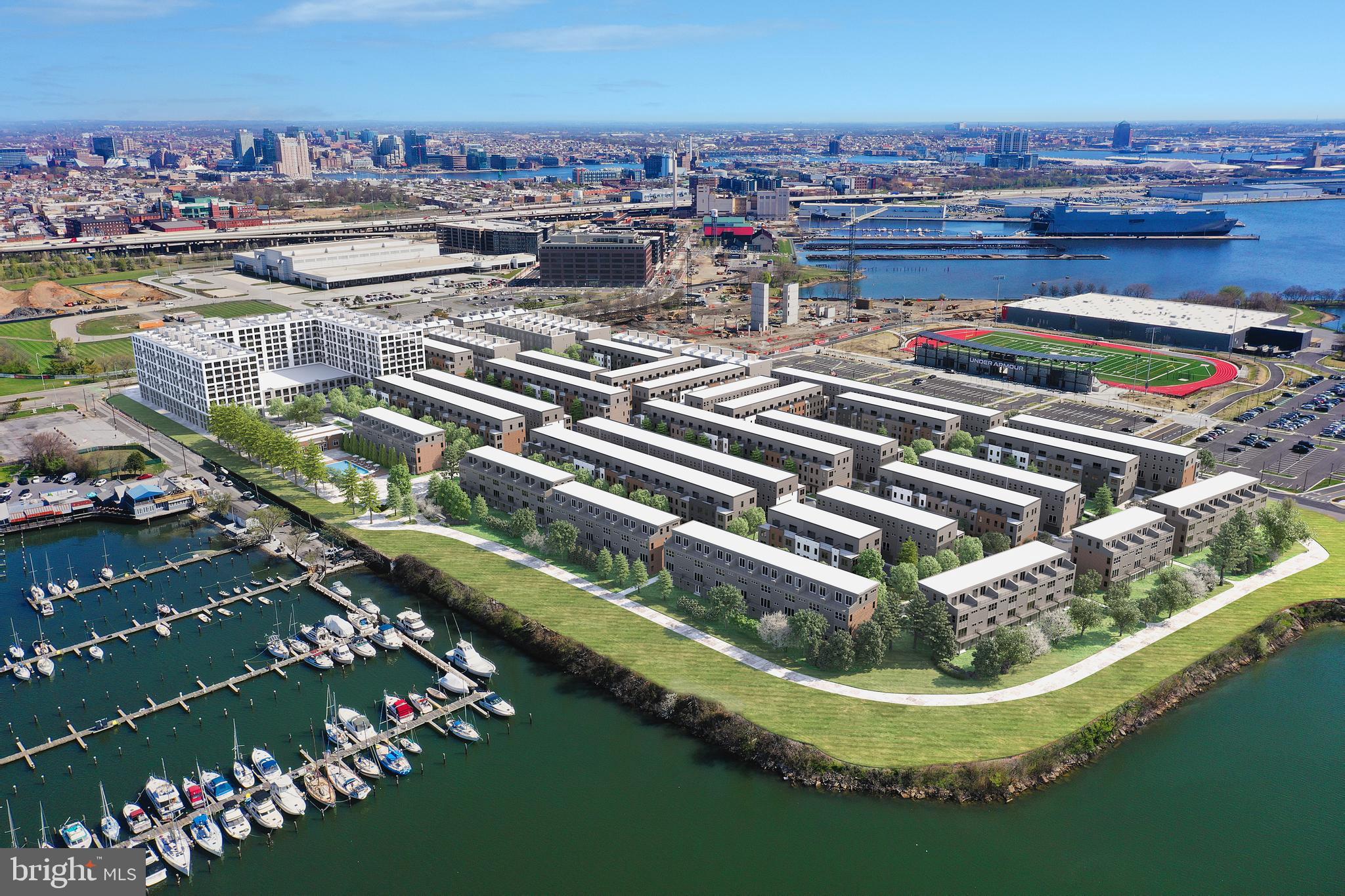 279 Light Street Baltimore, MD 21230 - Photo 29 of 29 a view of a lake with a building and a big yard