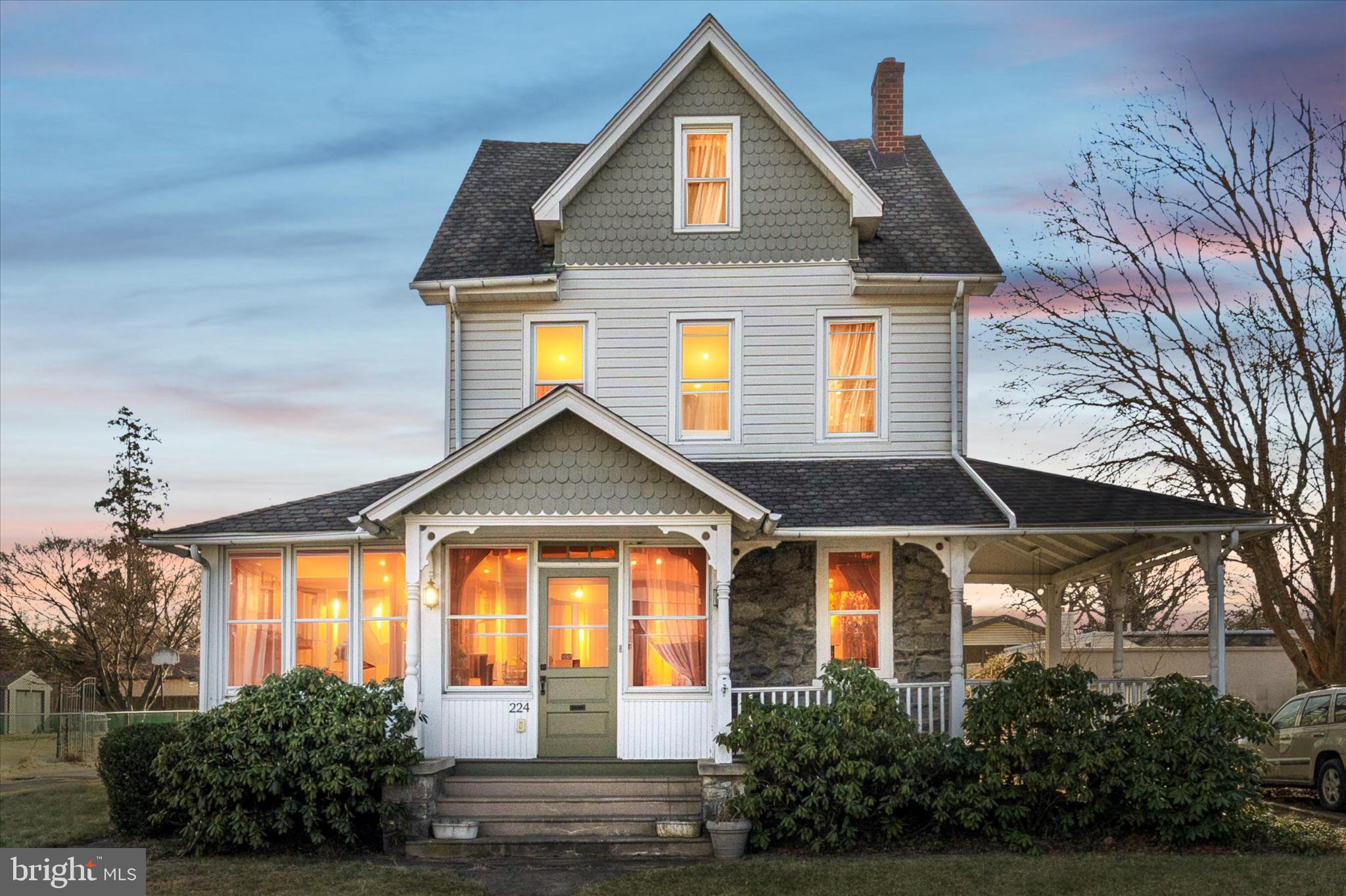 224 West Providence Road Aldan, PA 19018 - Photo 1 of 52 Charming Victorian home at twilight glow.