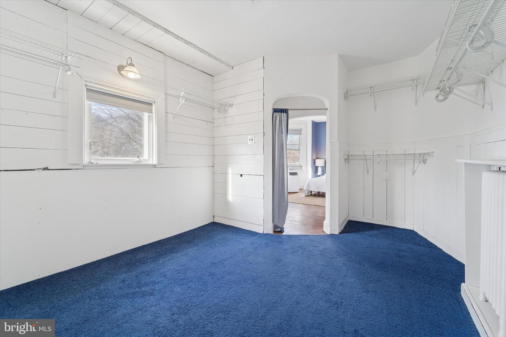 224 West Providence Road Aldan, PA 19018 - Photo 26 of 52 Spacious room with vibrant blue carpet.