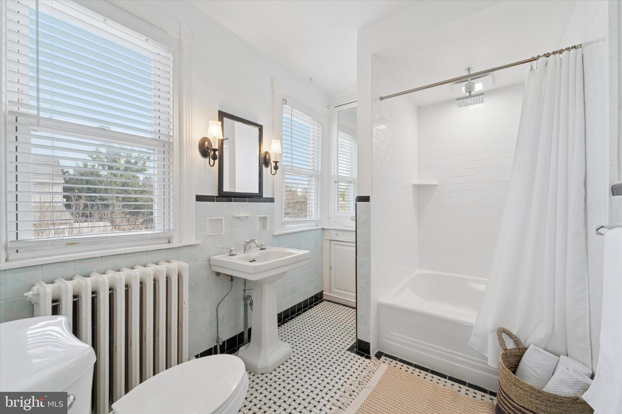 224 West Providence Road Aldan, PA 19018 - Photo 27 of 52 Bright and airy bathroom with vintage charm.