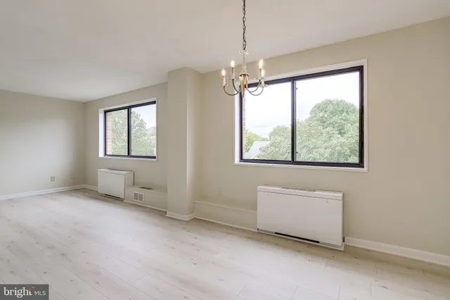 a kitchen with a stove and a sink