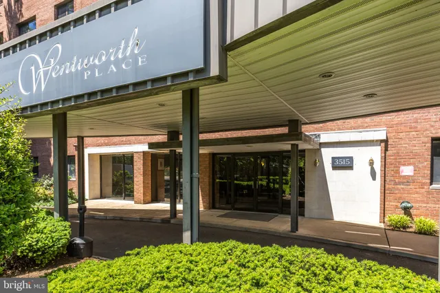 a stove top oven sitting inside of a kitchen